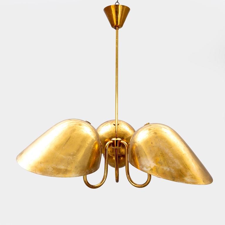 A 1940s Carl-Axel Acking brass ceiling pendant from Bröderna Malmströms.