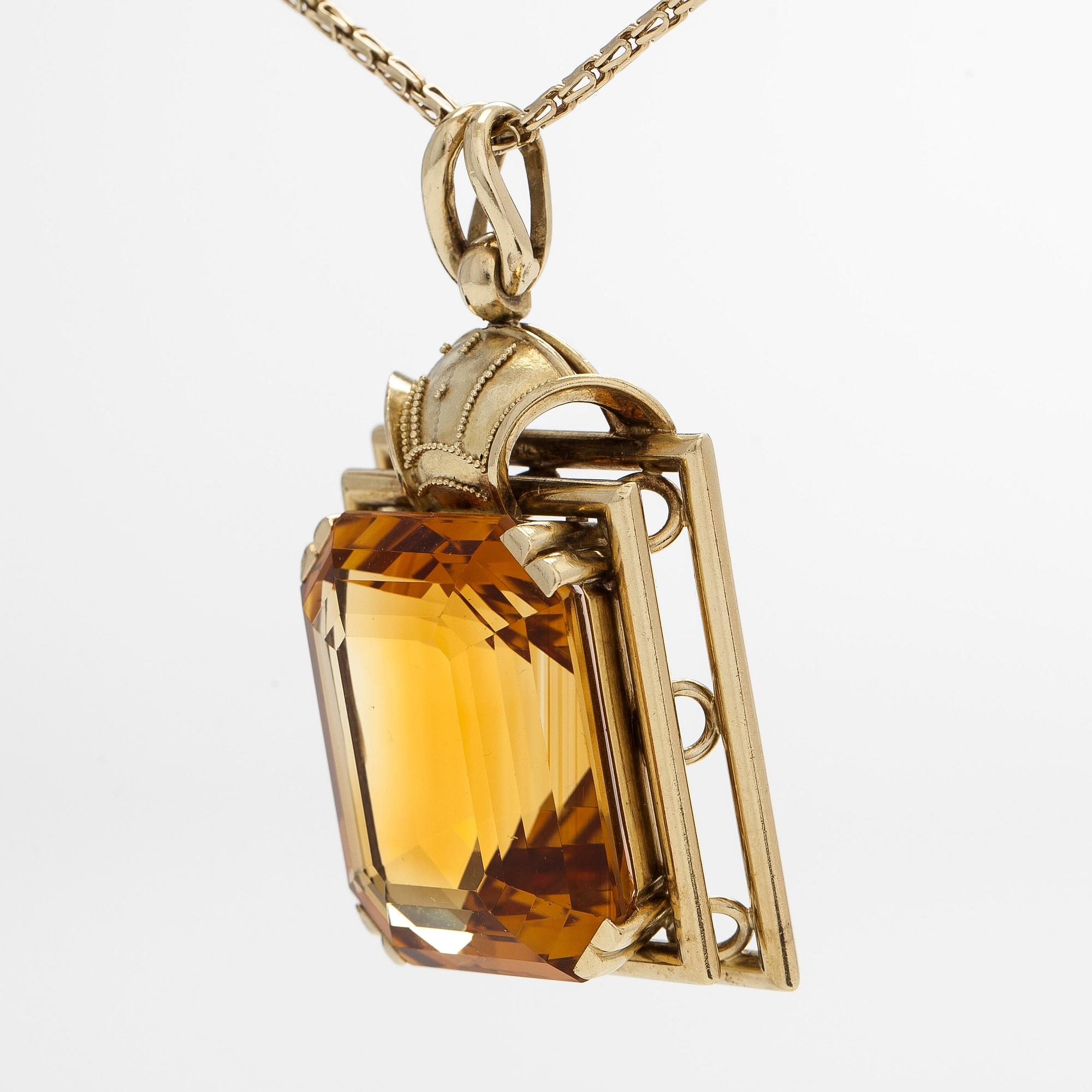 Necklace with pendant, 14K gold and a faceted citrine.