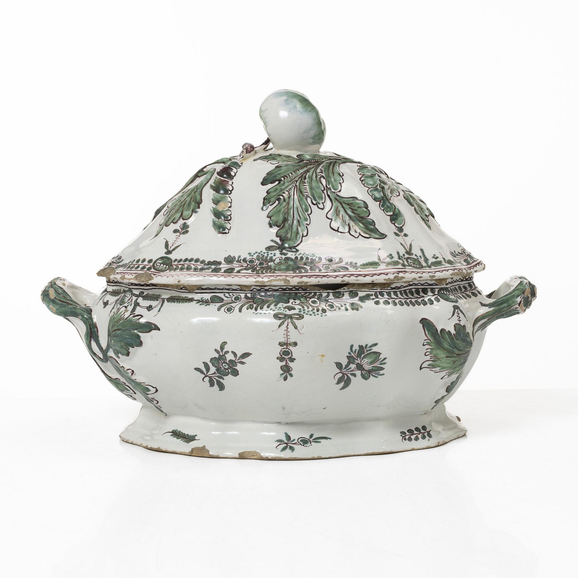 A faience lidded turrine, France, 18th/19th century.