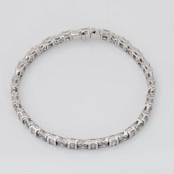 A brilliant- and baguette-cut diamond bracelet.