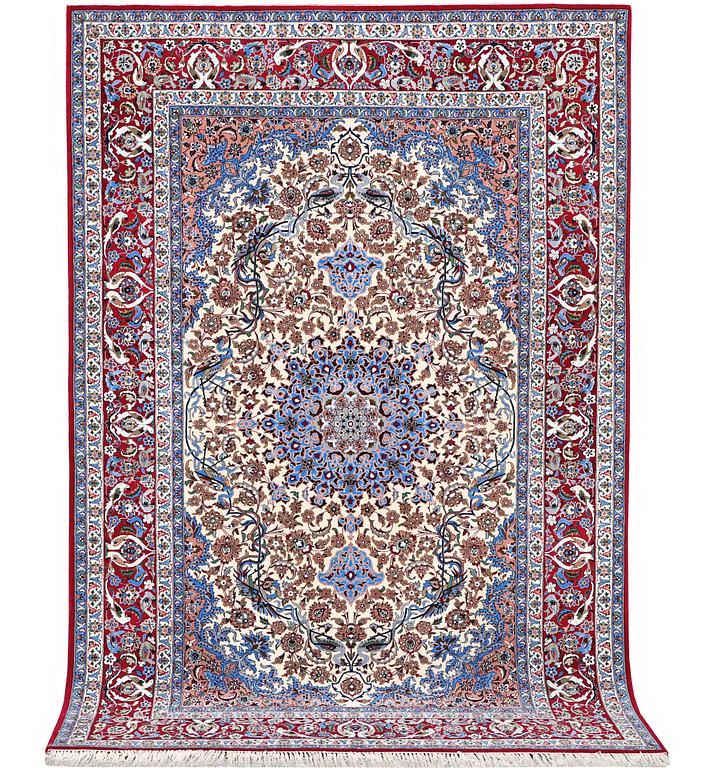 An Isfahan rug, a. 243 x 158 cm.