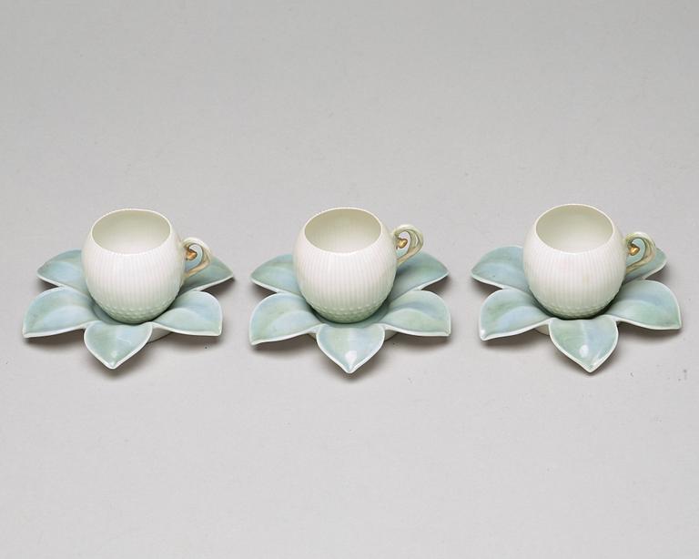 A set of six (3+3) cups with stands, Denmark, Bing & Gröndahl, early 20th Century.