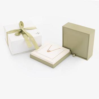 Van Cleef & Arpels, 18K gold and mother of pearl Alhambra heart necklace.