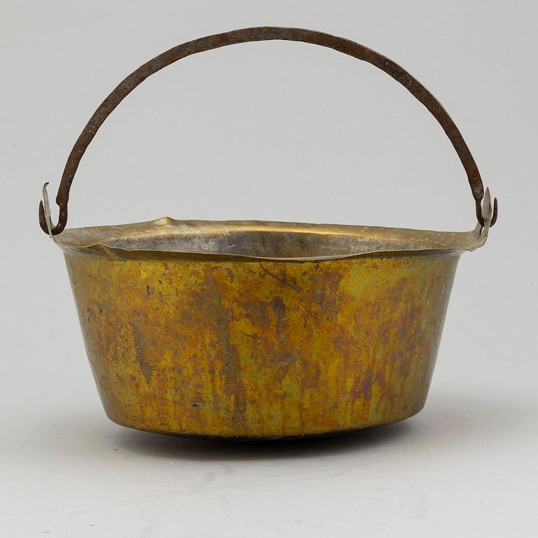 A 18th/19th century brass cauldron.
