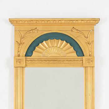 An Empire style mirror, first half of the 20th Century.