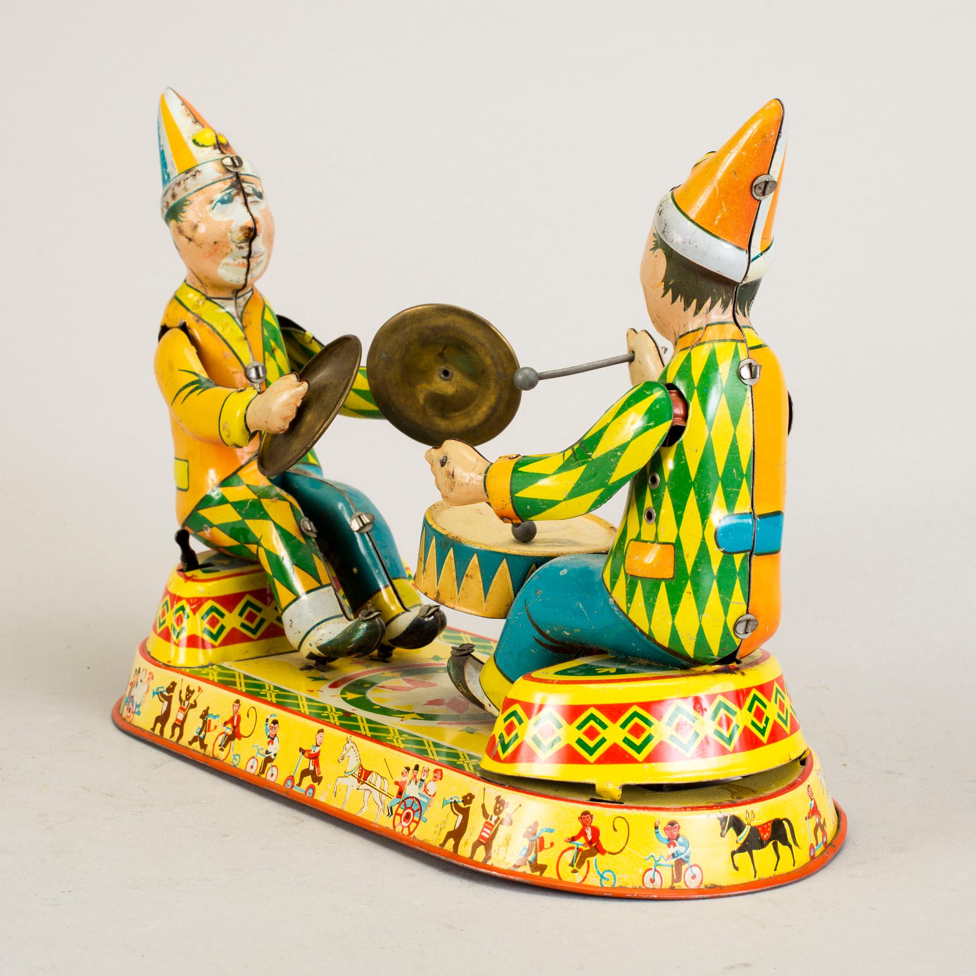 A lot of three tinplate toys Japan and Germany 1950s.