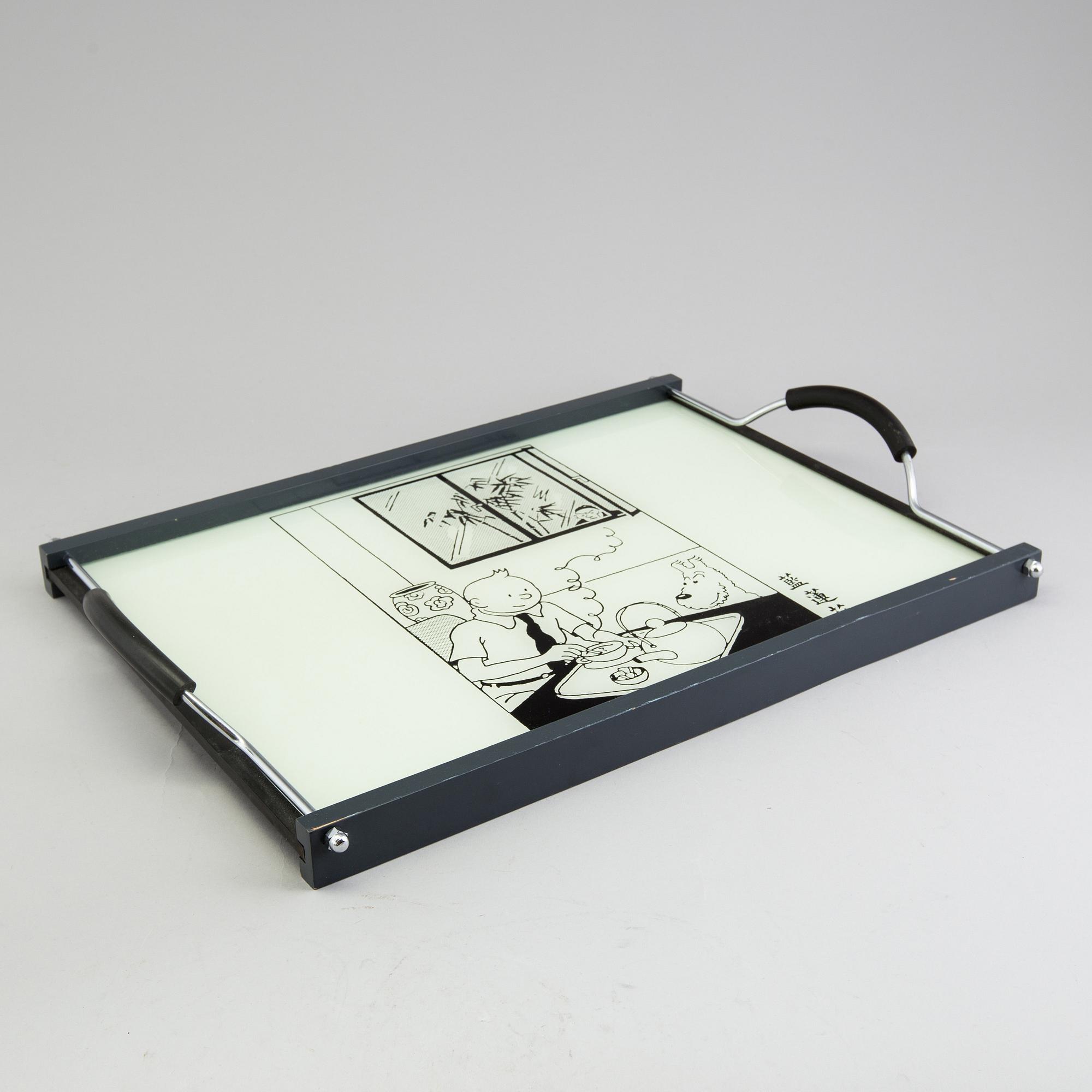 A set of 6 dinnerplates and two small plates and a serving tray depicting Tintin, Axis, France.