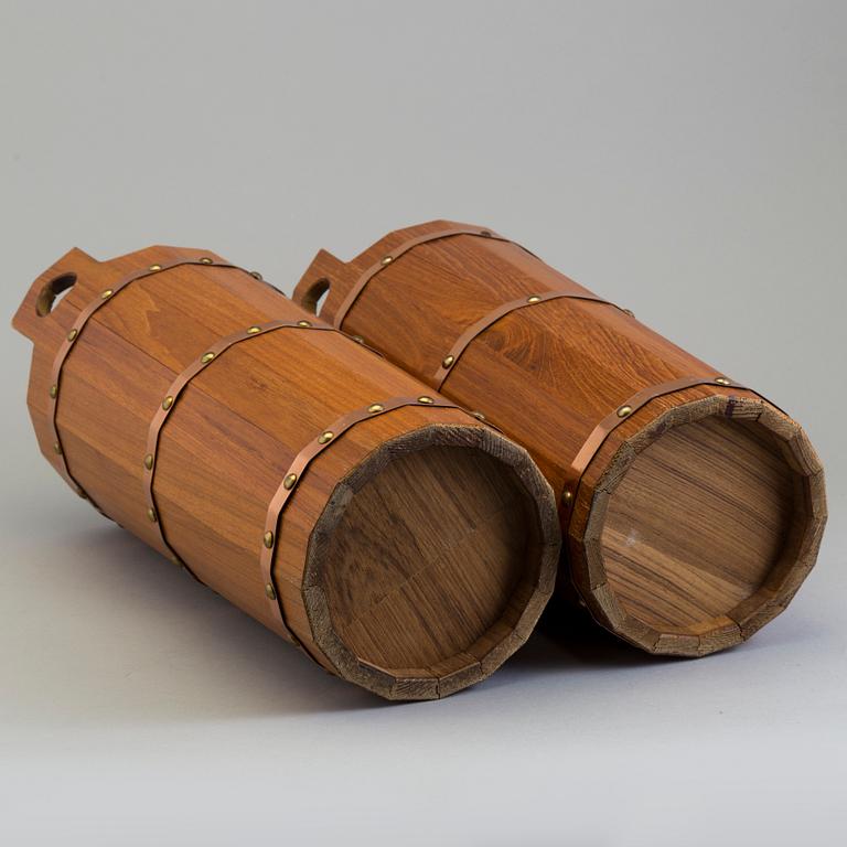 a pair of teak umbrella stands from the second half of the 20th century.