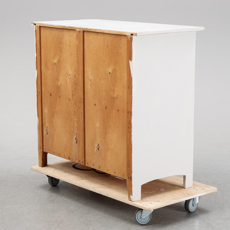 A conrtemporary painted cupboard.
