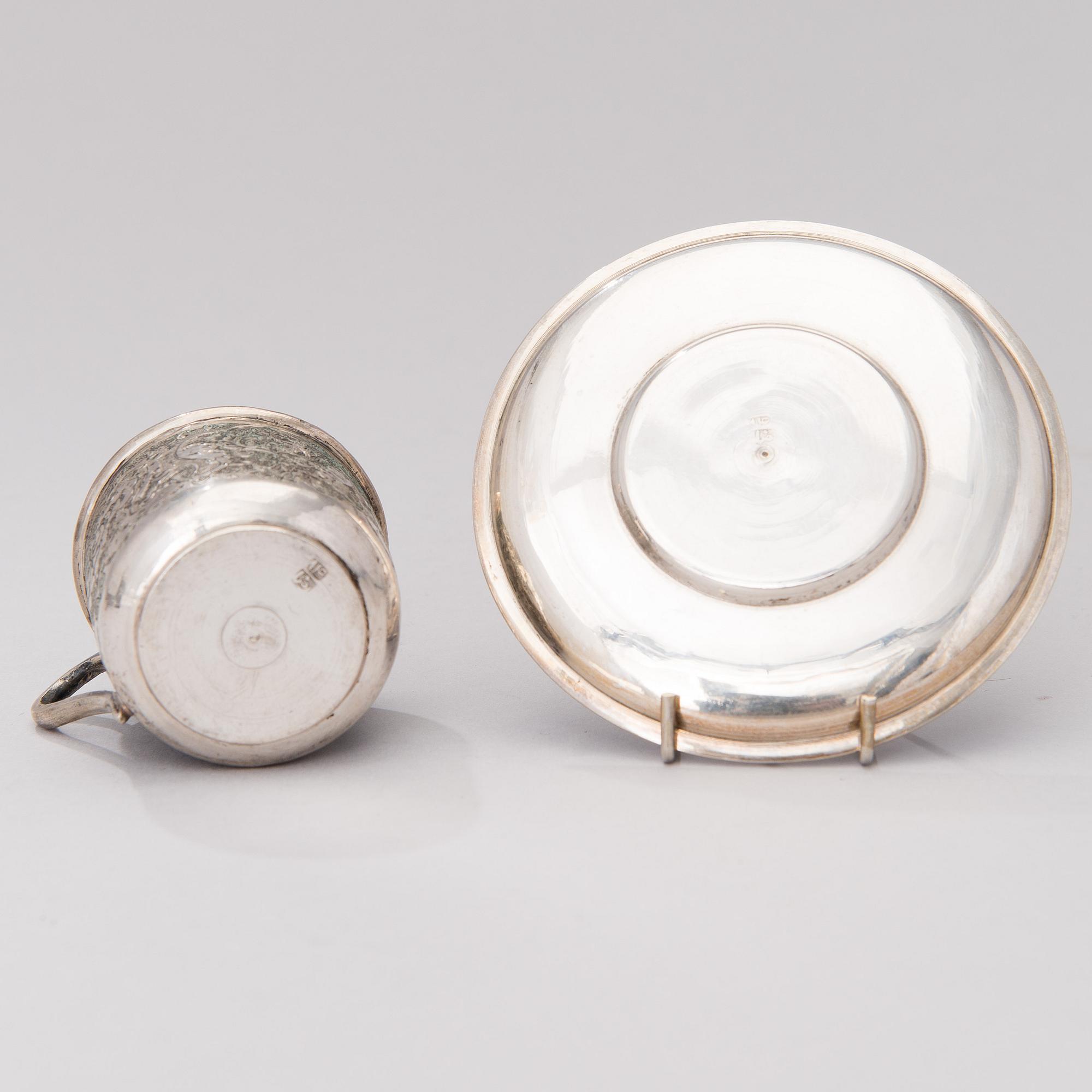 A Persian coffee set in silver, 7 pcs, Iran 20th century. Total weight circa 1334 g.