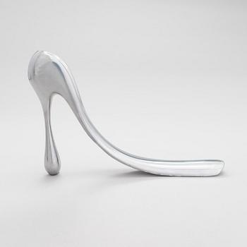 A metal shoe horn by Manolo Blahnik, 2000s.