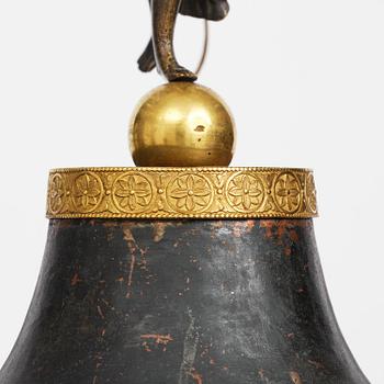 A patinated and ormolu six-light Empire chandelier, Stockholm, first part 19th century.