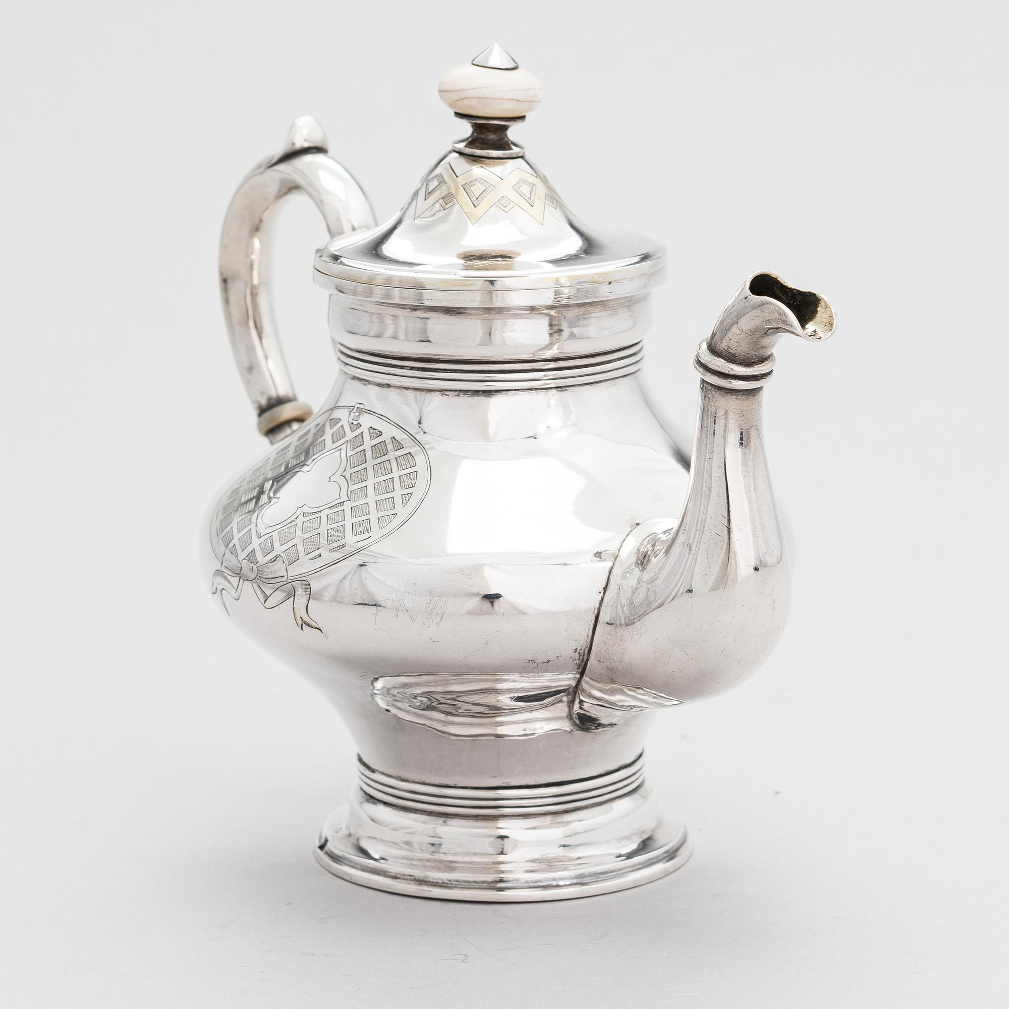 A Russian silver teapot, maker's mark of Andrei Wilgelmovich Wekman, Moscow 1871.