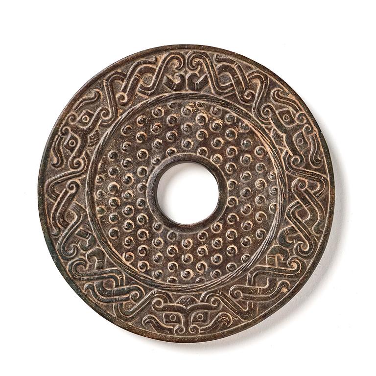 An archaistic bi disc.