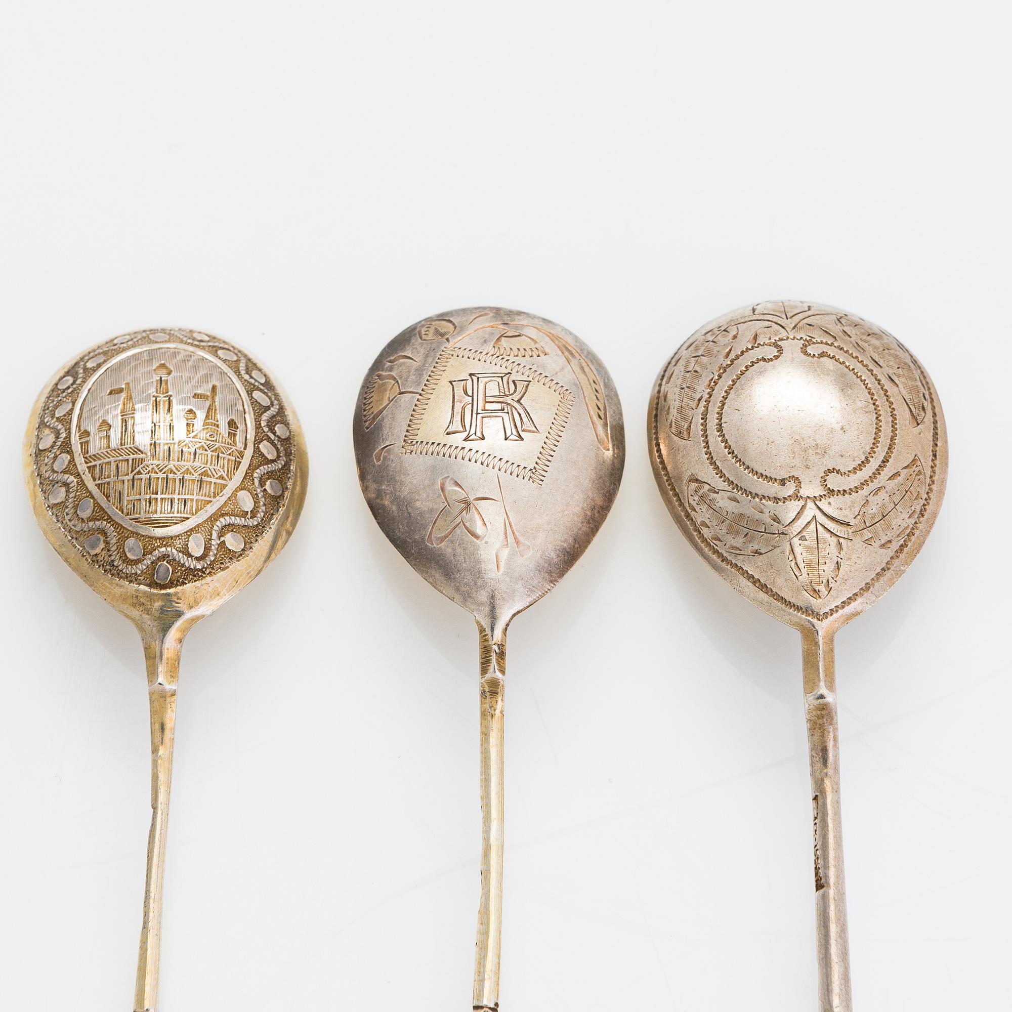 Twelve parcel-gilt teaspoons and a jam spoon, Russia 1887-1926.