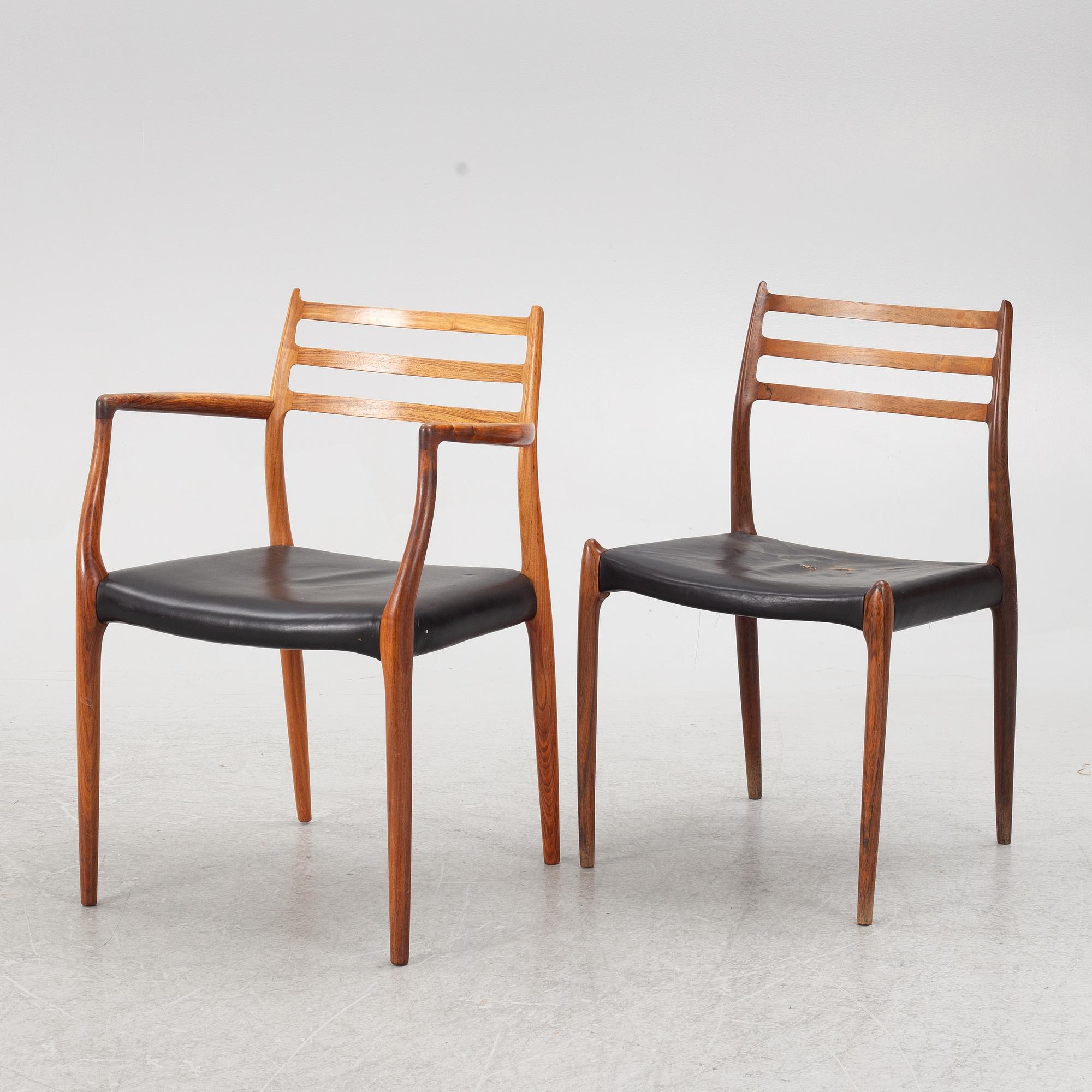 Niels Otto Møller, a rosewood dining table and eight rosewood chairs, Poul Jeppesen & JL Möller, Denmark, 1960's.