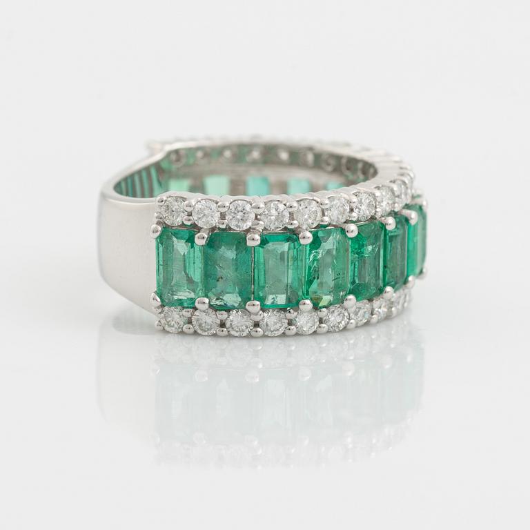 Emerald and brilliant cut diamond ring.