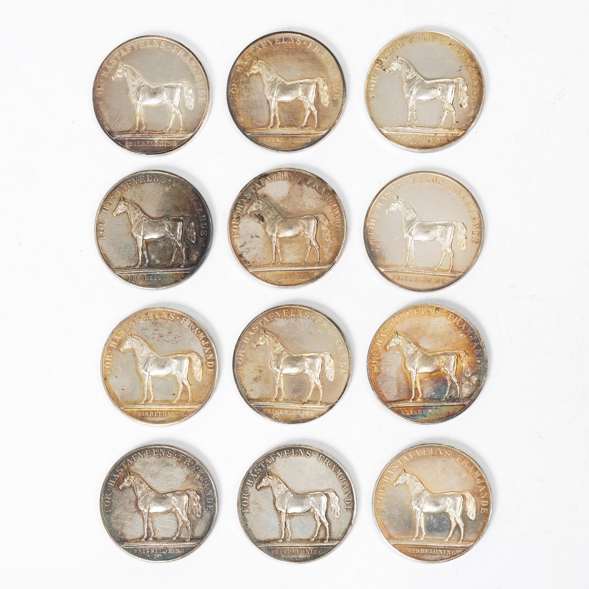Twelve silver medals, Kungliga Myntverket, Sweden, early 20th century.