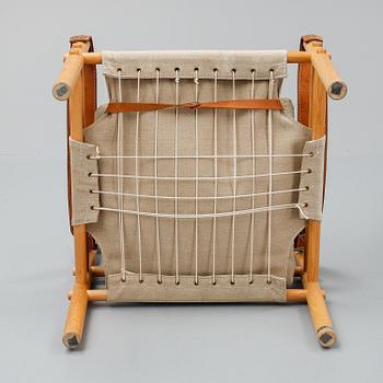 Arne Norell, a set of three "Sirocco" armchairs and two tables, Norell.