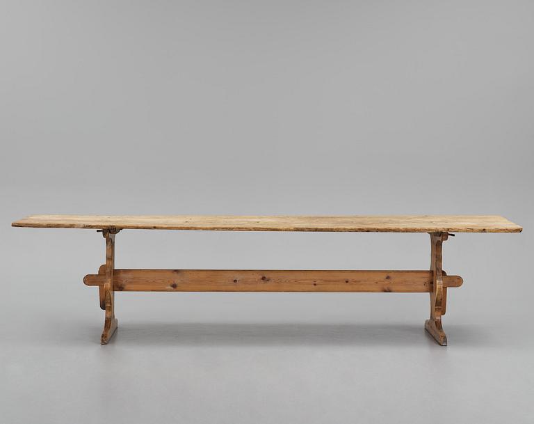 A pine trestle table, 20th century incorporating older elements.