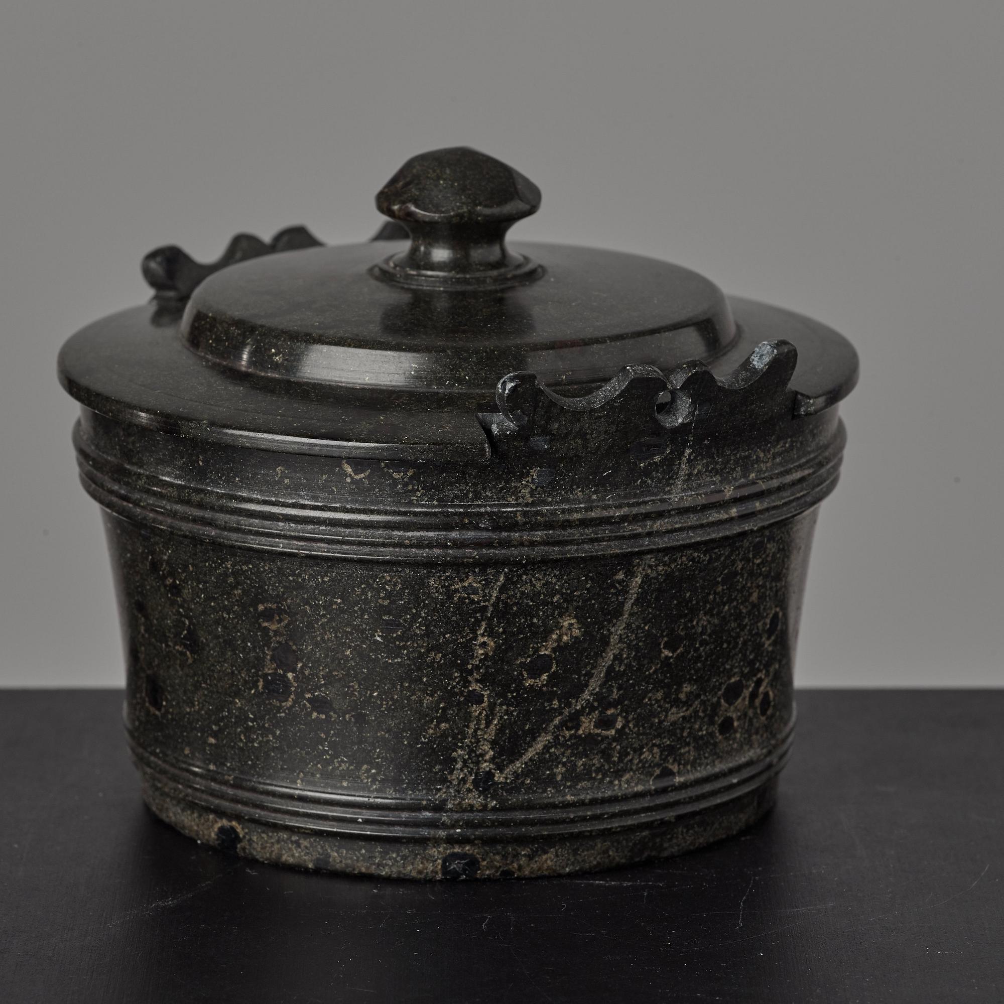 A serpentine stone butter box and cover circa 1800.