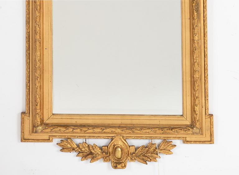 Spegel, gustaviansk stil, omkring 1900.