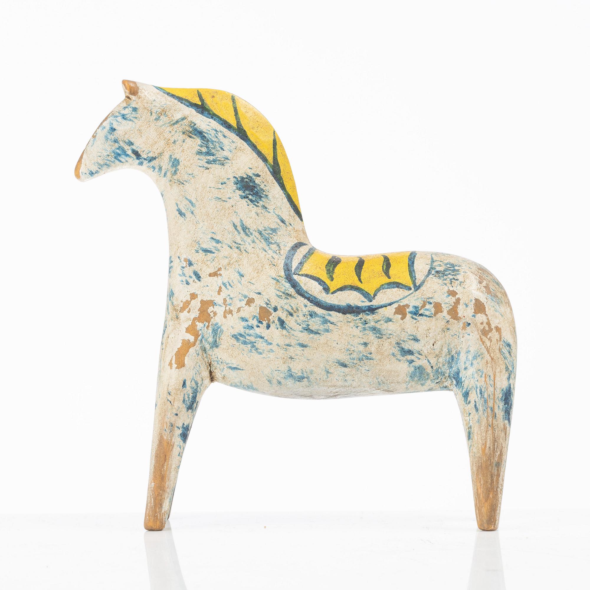 A carved and polychrome painted Dalecarlian horse, circa 1900.