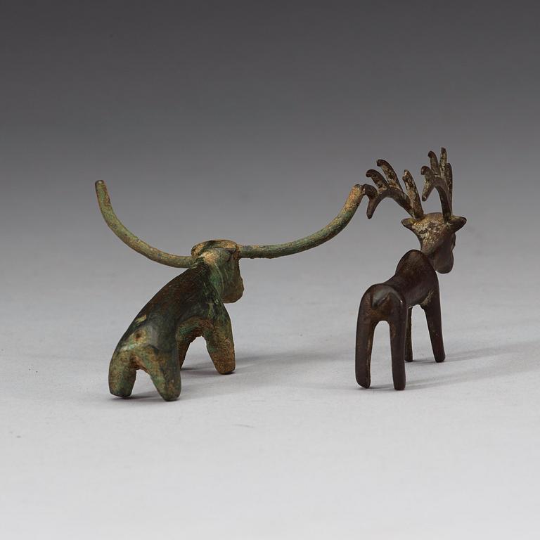Two bronze figures in the shape of a bull and a stag, presumably Scythian, about 700 B.C. - 200 A.D.