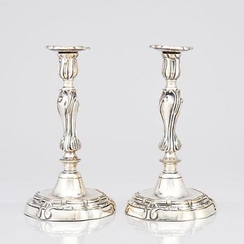 A pair of Rococo candlesticks by Stephen (Friedrich) T. Lemair, (privilge in Stockholm 1762), 1763.