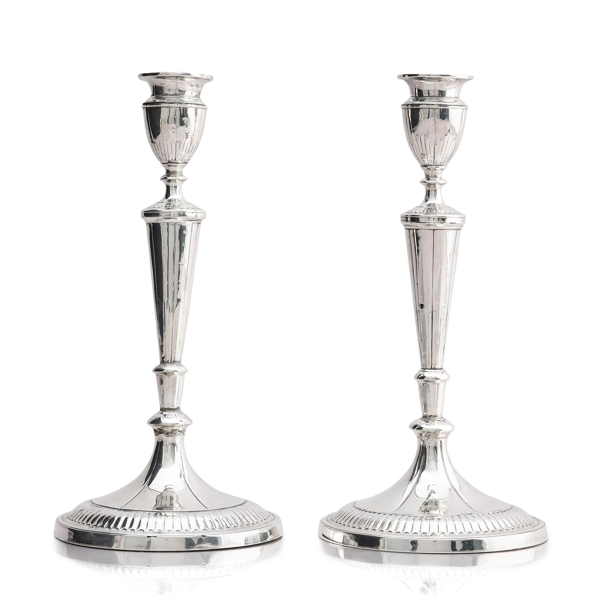 A pair of 18th century silver candlesticks, marks of John Parson & Co, Sheffield 1791.