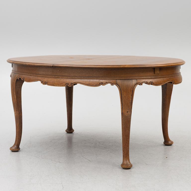 Dining table, 8 chairs, 2 armchairs, sideboard, Rococo style, early 20th century.
