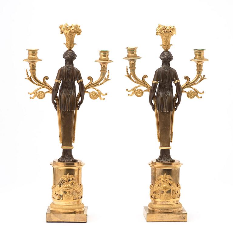 A pair of Swedish Empire early 19th century three-light candelabra.