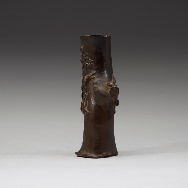 A bronze wood shaped vase, Ming dynasty (1368-1643).