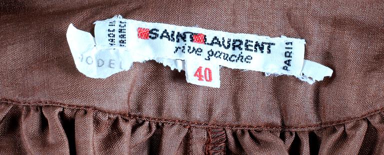 A set of two blouses by Yves Saint Laurent.