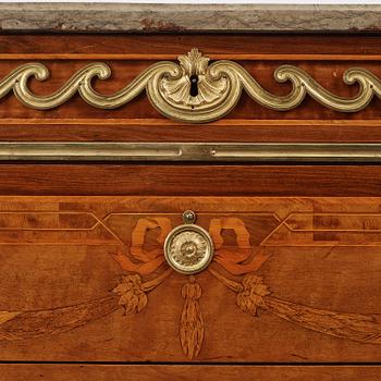 A Gustavian marquetry, ormolu-mounted and limestone-top commode by Georg Haupt (master in Stockholm 1770-84).