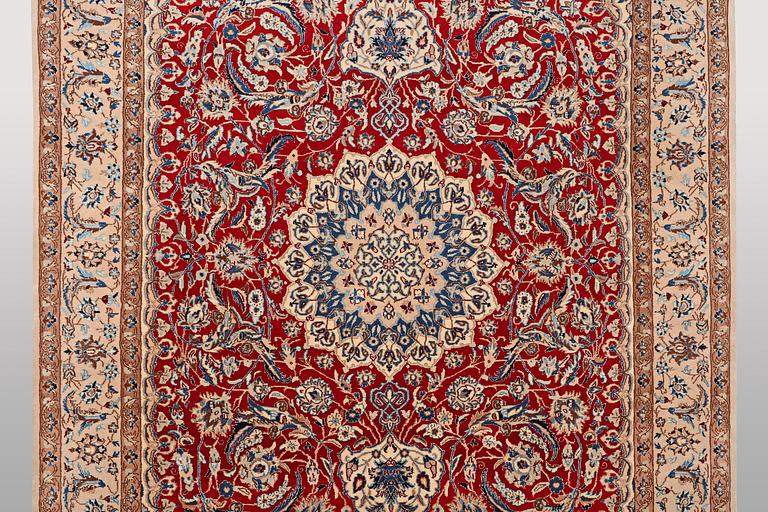 A carpet, Nain, part silk, 9 Laa, ca 295 x 178 cm.