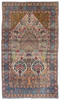 311. An antique Tehran carpet, north Persia, c. 323 x 195 cm.