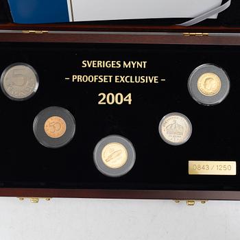 Coin set, “Sveriges mynt proofset exclusive”, comprising a year set and a gold coin commemorating the 250th anniversary of the Royal Palace.