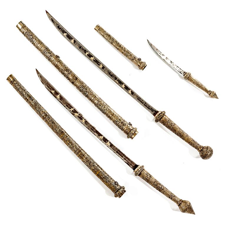 A set of three Burmese 'Dha' swords, late 19th /early 20th Century.