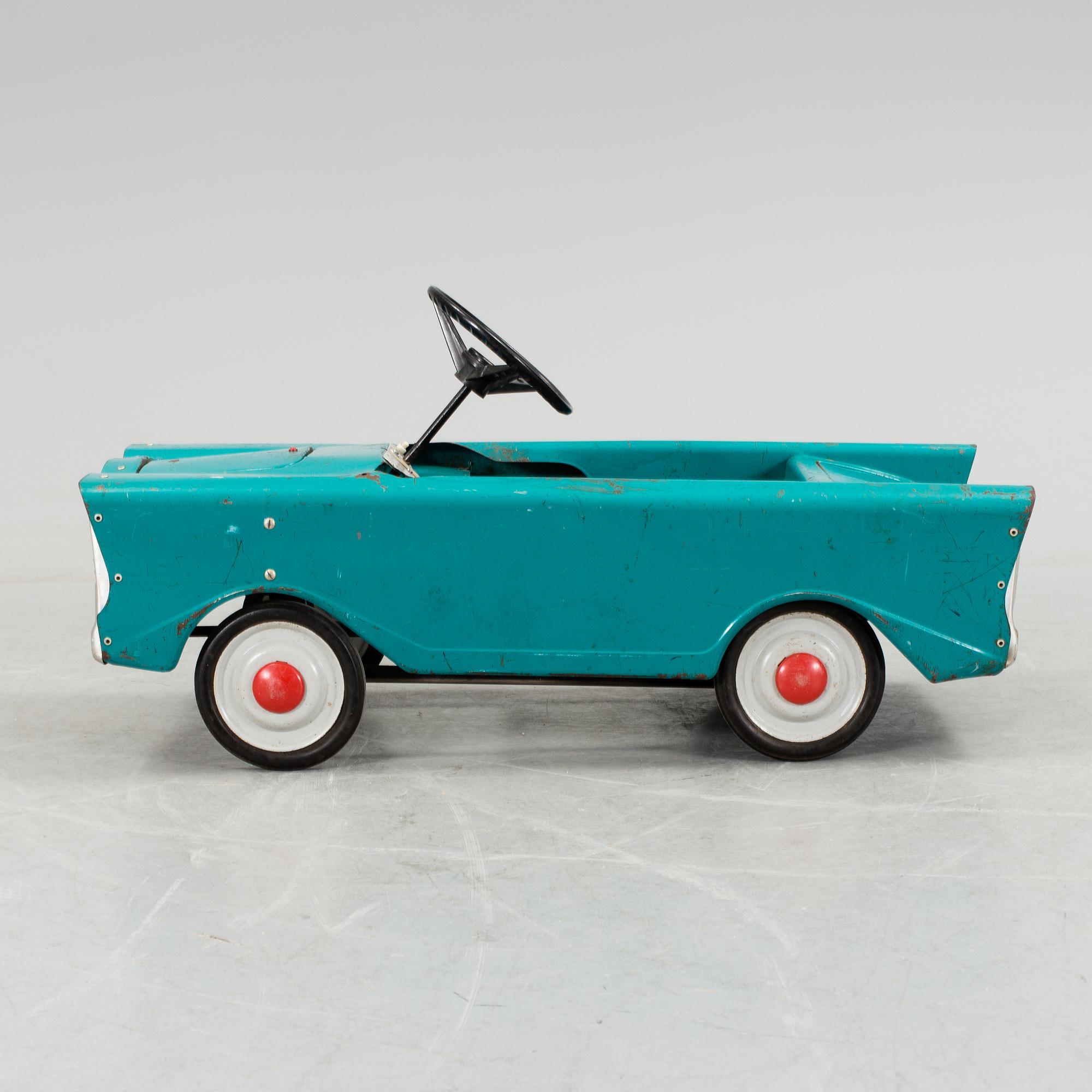 A toy car, mid 20th century.