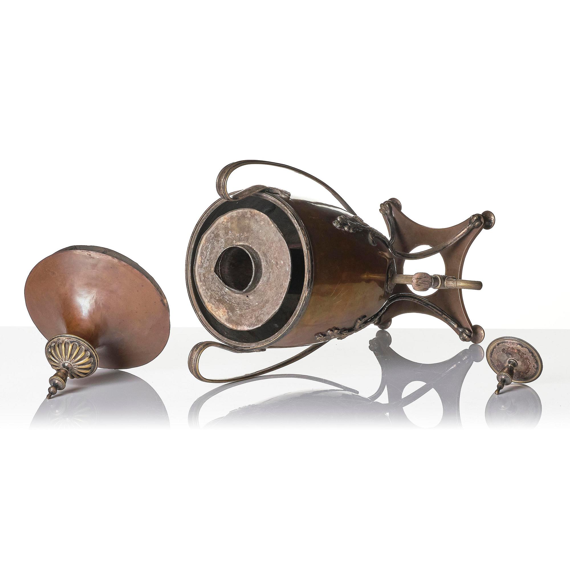 A George III copper and silvered-brass hot water urn, late 18th century.