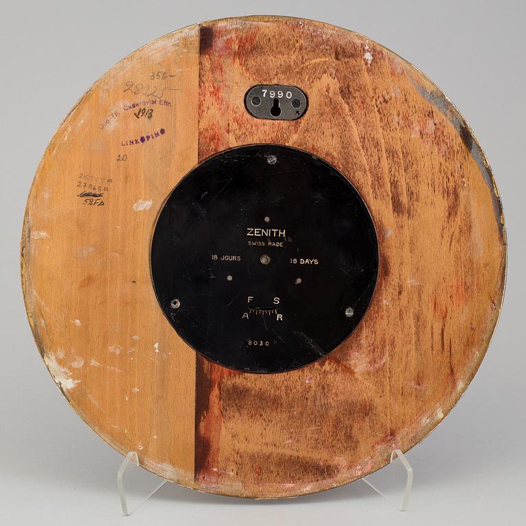 A WOODEN WALL CLOCK, Zenith, first half of the 20th century.