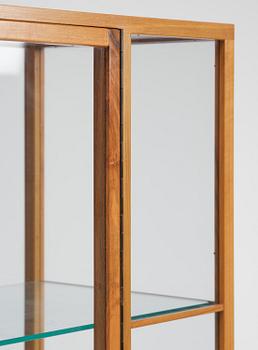 Josef Frank, a walnut showcase cabinet model "B 2077", Firma Svenskt Tenn.