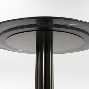 Louise Roe, a 'Roundabout' dining table with marble top.