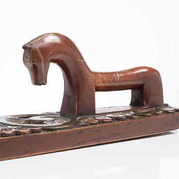A carved and polychrome painted mangle board, Sweden, late 18th / early 19th century.