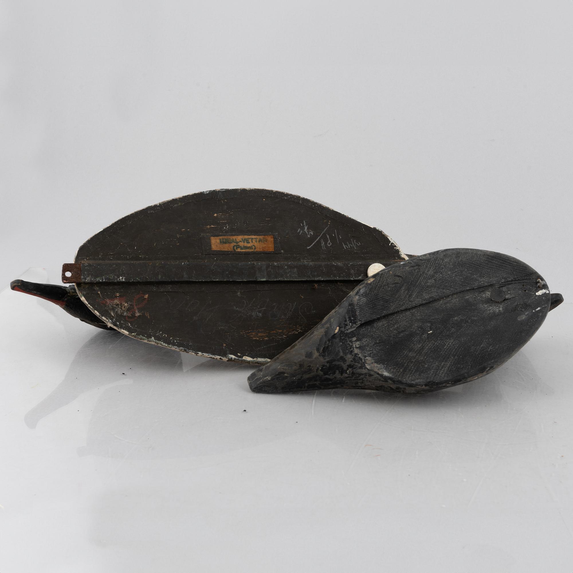 A set of six wooden duck decoys, 20th century.