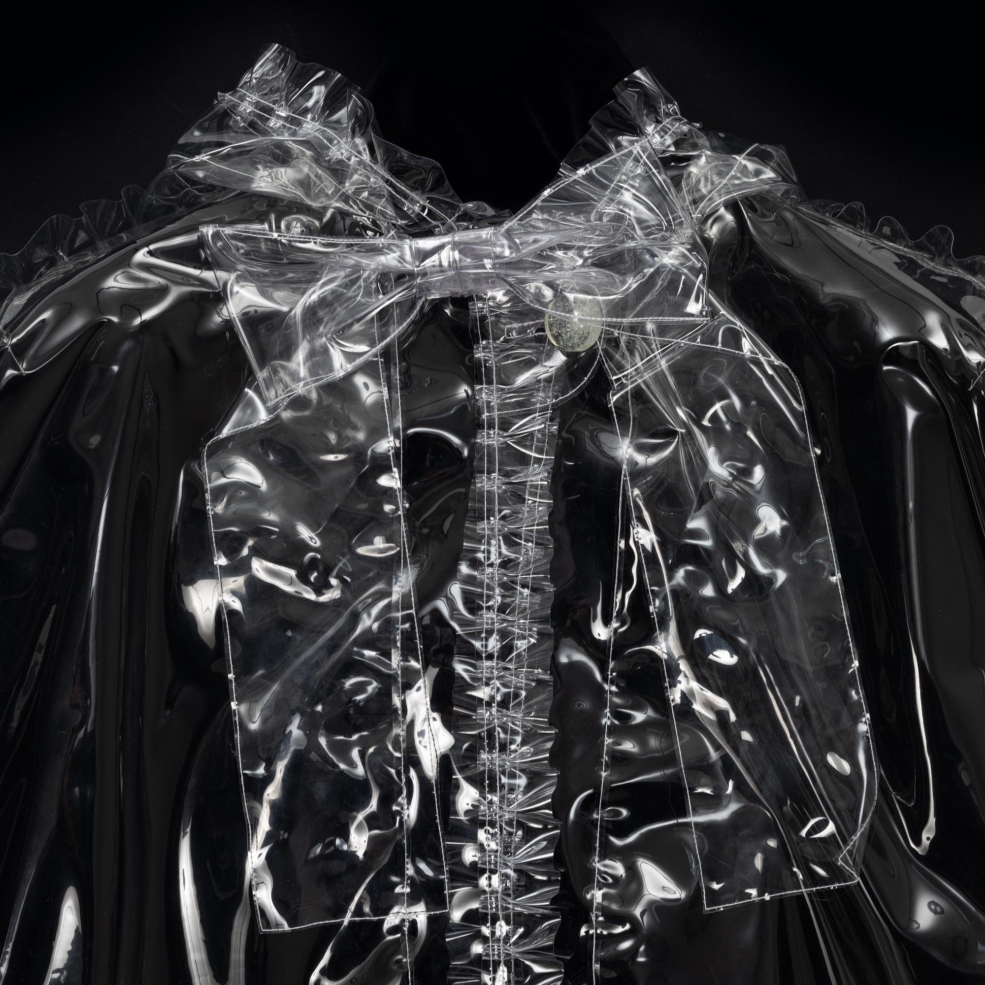 Chanel, a raincape, size S.