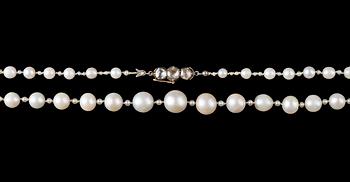 254. A natural fresh water pearl necklace, 1930's.