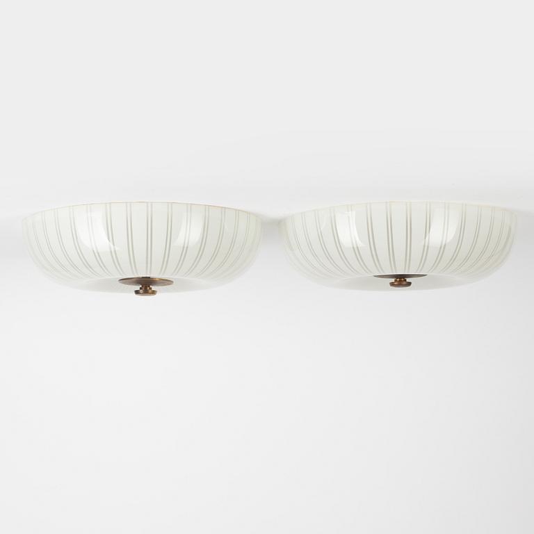 A pair of Swedish Modern ceiling lamps, 1940's.