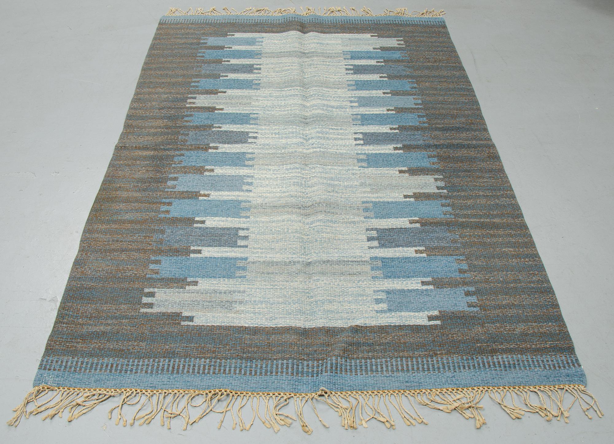 A carpet, flat weave, ca 245 x 154-155 cm, signed ML, Kasthall.